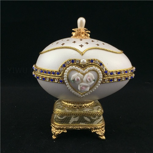 Real hand decorated carved etched goose egg music box